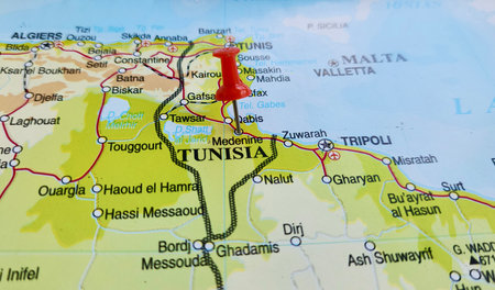 View of Medenine, is the major town in south-eastern Tunisia, on a geographical map of Africa, marked with red pushpinの写真素材