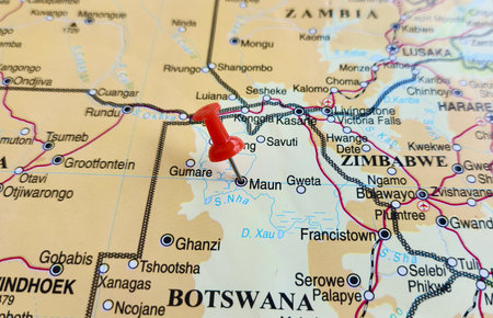 View of Maun, is the second-largest village in Botswana, on a geographical map of Africa, marked with red pushpinの写真素材