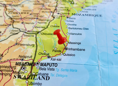 View of Inhambane, is a city located in southern Mozambique, lying on Inhambane Bay, on a geographical map of Africa, marked with red pushpinの写真素材