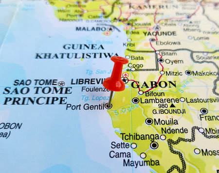 View of Port-Gentil or Mandji, is the second-largest city of Gabon, and a leading seaport, on a geographical map of Africa, marked with red pushpinの写真素材