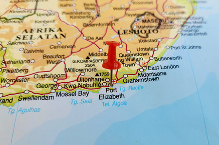 View of Port Elizabeth, fringes Algoa Bay at the western end of the Sunshine Coast, South Africa, on a geographical map of Africa, marked with red pushpinの写真素材