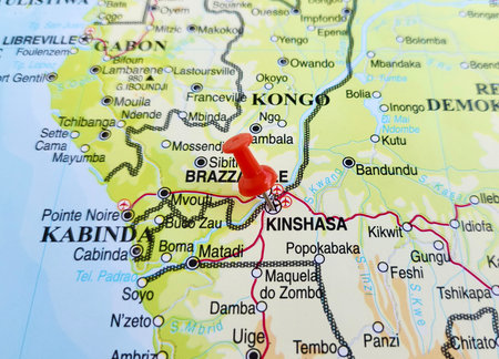 View of Kinshasa, Capital and the largest city of the Democratic Republic of the Congo, on a geographical map of Africa, marked with red pushpinの写真素材