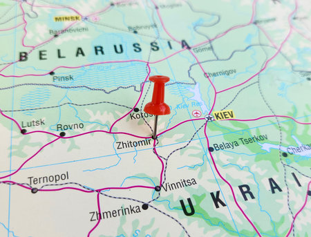 View of Zhytomyr, Capital city of Zhytomyr Oblast in northwestern Ukraine, on a geographical map of Europa, marked with red pushpinの写真素材