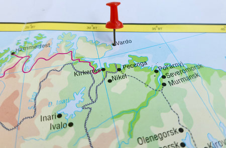 View of Vardo, Varggat, or Vuorea is a town and the administrative centre of Vardo Municipality in Finnmark county, Norway, on a geographical map of Europa, marked with red pushpinの写真素材
