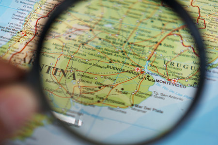 view of Buenos Aires, Argentina on a geographic map of the Americas, seen using a magnifying glassの写真素材