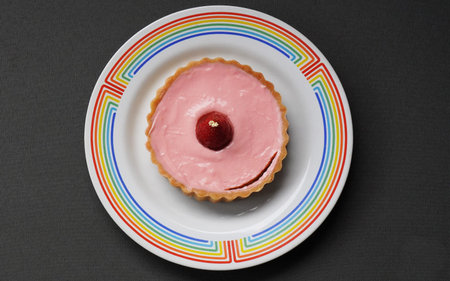 Strawberry cheese pie with strawberry cream cheese topping and fresh strawberries and a bit of gold...