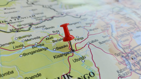 View of Kisangani, City in the Democratic Republic of Congo, on a geographical map of Africa, marked with red push pinの写真素材