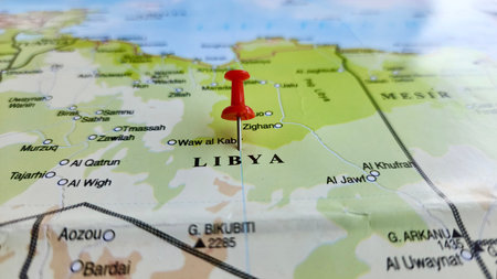 View of Libya, on a geographical map of Africa, marked with red pushpinの写真素材