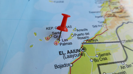 View of Las Palmas, Municipality, city of the province of Las Palmas, and capital of the Canary Islands, Spain, on a geographical map of Africa, marked with red push pinの写真素材