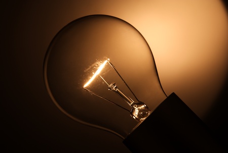 in darkness lights light bulb の写真素材