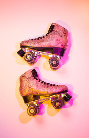 Retro pink glittery roller skates - poster layout design, disco style. Colorful (multicolor tonal transitions) background with free text (copy) space.