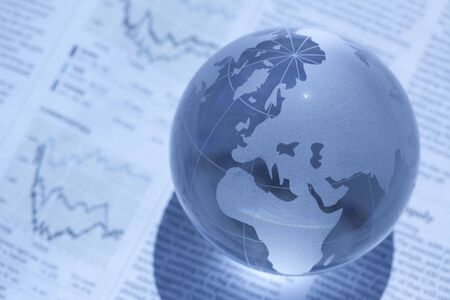 Globe and newspaperの写真素材