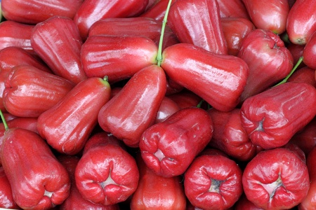Red rose apple in basket の写真素材