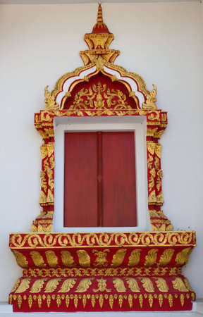 Window frame of Thai templesの写真素材