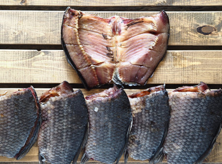 Russian river fish. Sliced dried salted fish, which is usually called balyk, without the head and...