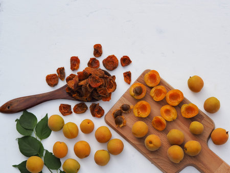Dried fruit harvesting season. Dried apricot chips. Organic, natural, healthy food.の写真素材