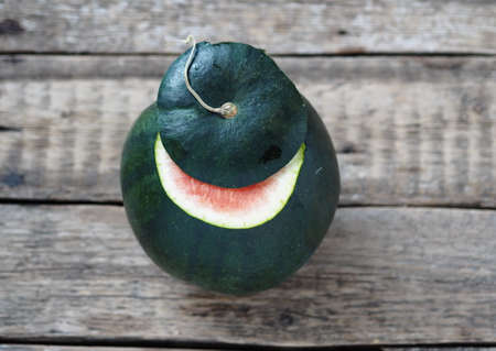 Watermelon on a wooden background. Healthy natural popular food.の写真素材