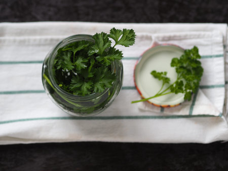 The process of preserving fresh herbs for a long time. Put them in a glass jar, under the lid and in...