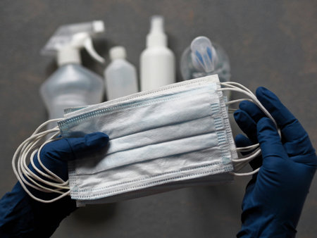 Protective gear to prevent viral infection, such as hand sanitizer, surgical mask, and rubber...