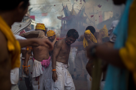 PHUKET, THAILAND ? October 1:Taoist devotees participate in a street procession of the Nine Emperor Gods Festival, known locally as the Phuket Vegetarian Festival on the 1 October, 2014. in Phuket Town, Phuket, Thailand.のeditorial素材