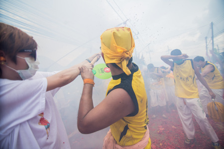 PHUKET, THAILAND  October 1:Taoist devotees participate in a street procession of the Nine Emperor Gods Festival, known locally as the Phuket Vegetarian Festival on the 1 October, 2014. in Phuket Town, Phuket, Thailand.のeditorial素材