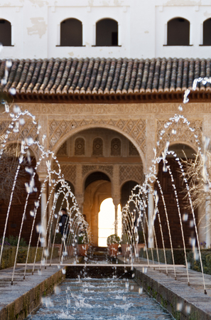 Fountains in the courtyard of the palace The Alhambra. Arabic architecture. Granada, Spainの写真素材