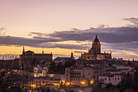 View of Segovia with gothic cathedral, typical old houses, city wall. nigth, pinnacles and tower. Segovia, Spainの写真素材