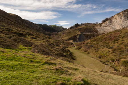 Geological rock formations and cliffs on the Flysch route. Cantabrian Sea. In Vizcaya, Basque...