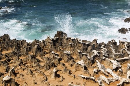 Fishermen's route in the Alentejo, promenade with cliffs in Portugal. Wooden walkway along the coastline.の写真素材