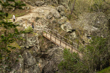Suspension bridge on the fishermen's route, in Arenas de San Pedro. Avila, Castile and Leonのeditorial素材