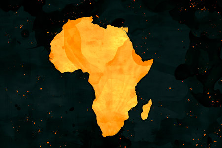 Watercolor illustration of Africa map on black background. Shape of the African continent. Concept of droughts and desertification in Africaの素材