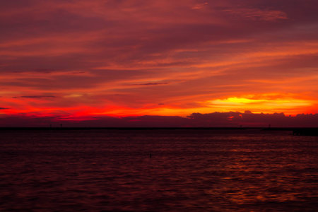 sunset sky at seashore in eveningの写真素材