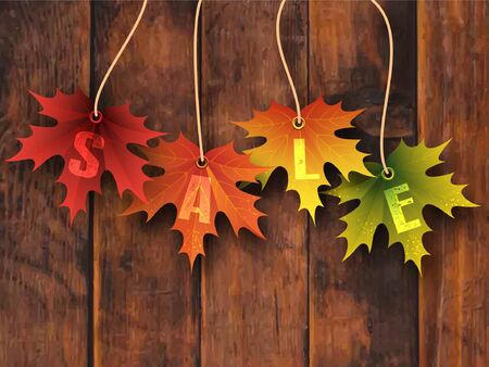 Autumn vector design with maple leaf sale labels isolated on wooden background.のイラスト素材