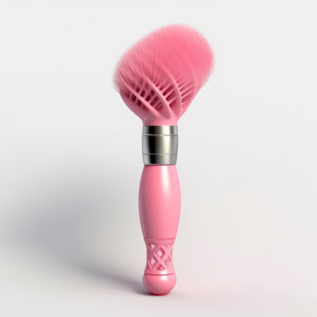 Pink makeup brush on a white background. 3d rendering illustration.の素材