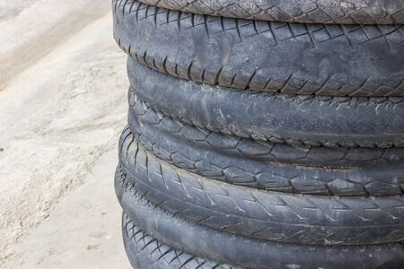 Background made of stack of used motorcycle tiresの写真素材