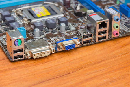 Computer Serial Port on a wooden tableの写真素材