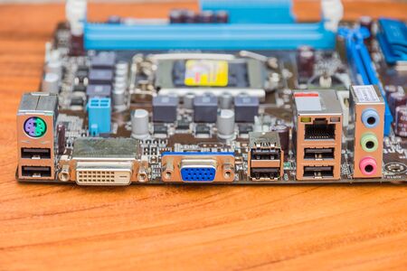 Computer Serial Port on a wooden tableの写真素材