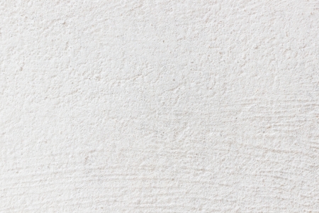 Seamless white painted concrete wall texture/background.の写真素材