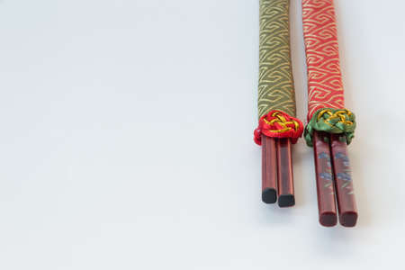 Kitchen: Chopsticks isolated on white backgroundの写真素材
