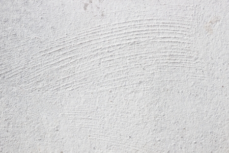 Seamless white painted concrete wall texture/background.の写真素材