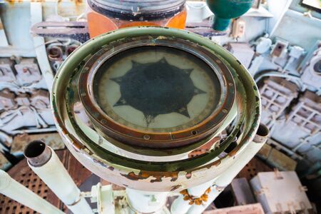 Vintage compass on the old boatの写真素材