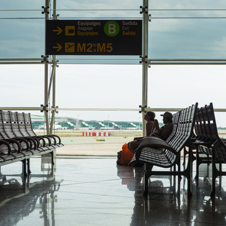 BARCELONA, SPAIN - MAY 30, 2014  Waiting room inside El Prat International Airport のeditorial素材