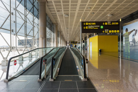 BARCELONA, SPAIN - MAY 30, 2014  Corridor inside El Prat International Airport  