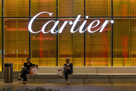 DUBAI, UAE - MARCH 28, 2014  Cartier sign outside Dubai Mall  のeditorial素材