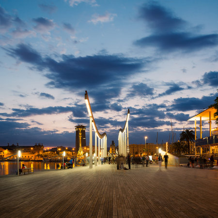 BARCELONA, SPAIN - JUNE 1, 2014  Marina Port Vell and the Rambla del Mar at dusk  