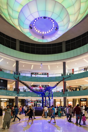 DUBAI, UAE - MARCH 28, 2014: People walking inside Dubai Mall. At over 12 million sq ft, it is the world's largest shopping mall. のeditorial素材