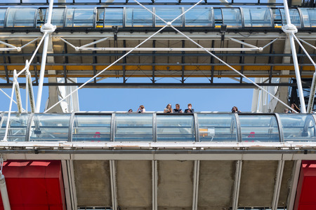 PARIS, FRANCE - MAY 16, 2014: Tourists inside the Centre Georges Pompidou. The structure was completed in 1977 and is one of most recognizable landmarks in Paris.のeditorial素材