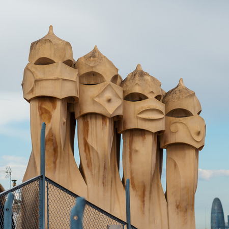 BARCELONA, SPAIN - MAY 31, 2014: Chimneys on rooftop of Gaudi's masterpiece Casa Batlo. The building that is now Casa Batllo was built in 1877 by Antoni Gaudi, commissioned by Lluis Sala Sanchez.のeditorial素材