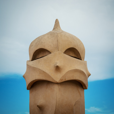 BARCELONA, SPAIN - MAY 31, 2014: Chimney on rooftop of Gaudi's masterpiece Casa Batlo. The building that is now Casa Batllo was built in 1877 by Antoni Gaudi, commissioned by Lluis Sala Sanchez.のeditorial素材