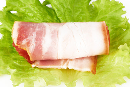 piece of bacon  on a white background 
